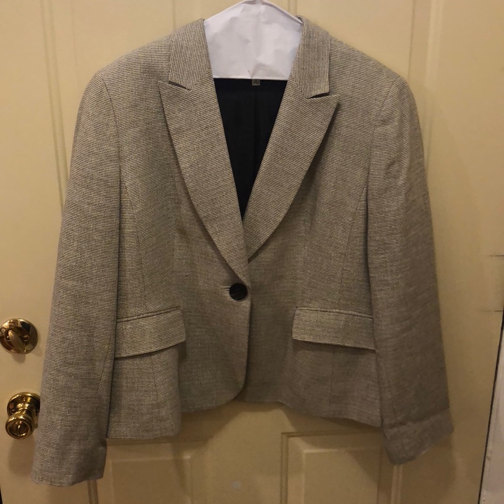 White blazer, some brown tint to it